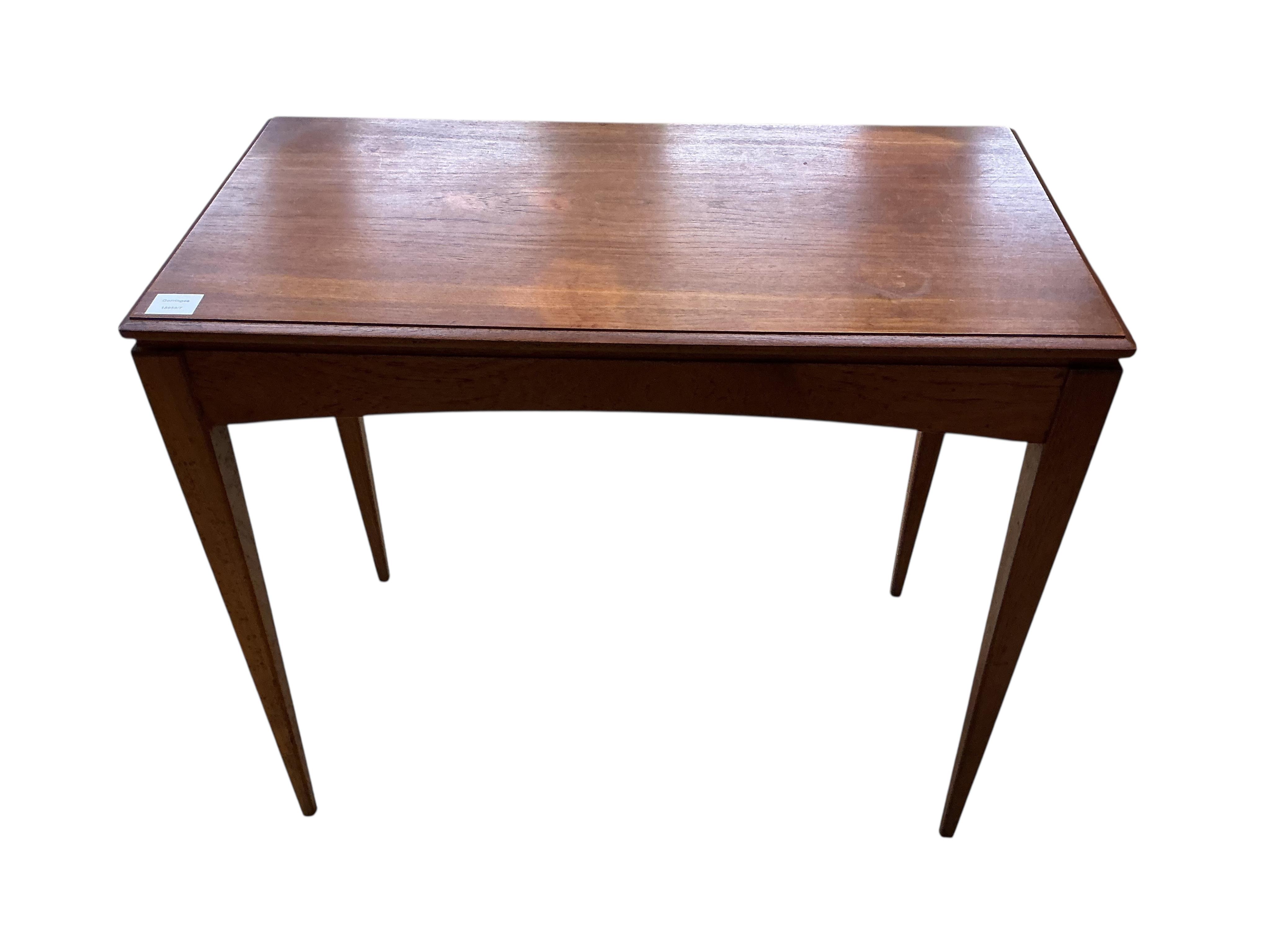 In the manner of Gordon Russell, a mid century rectangular teak side table, width 85cm, depth 44cm, height 76cm